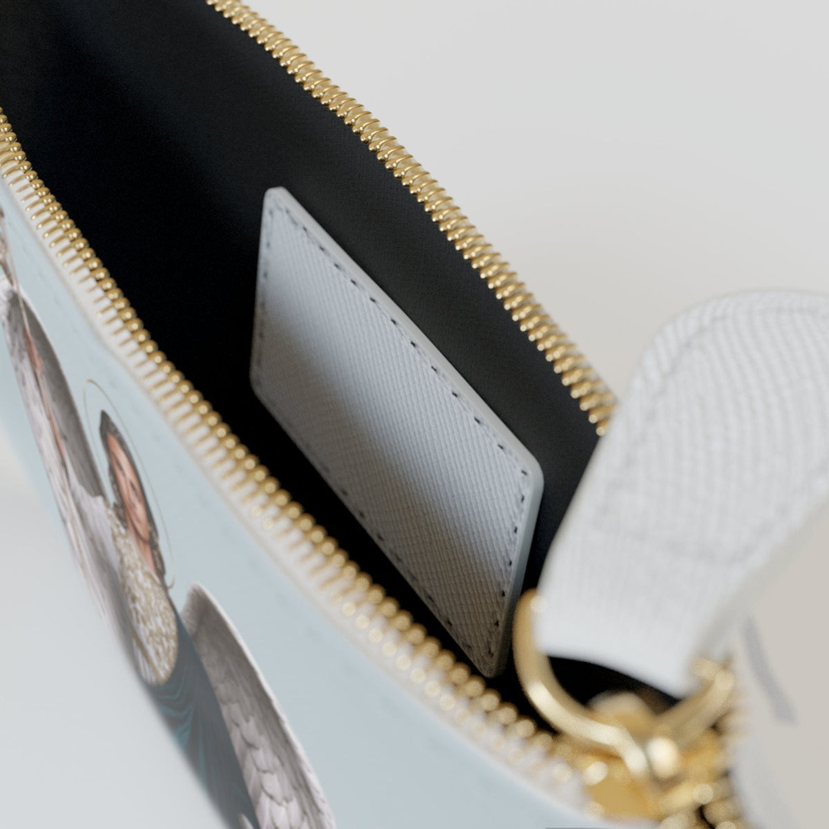 St. Raphael the Archangel Mini Clutch Pouch (Heavenly Blue) Copyright VENXARA